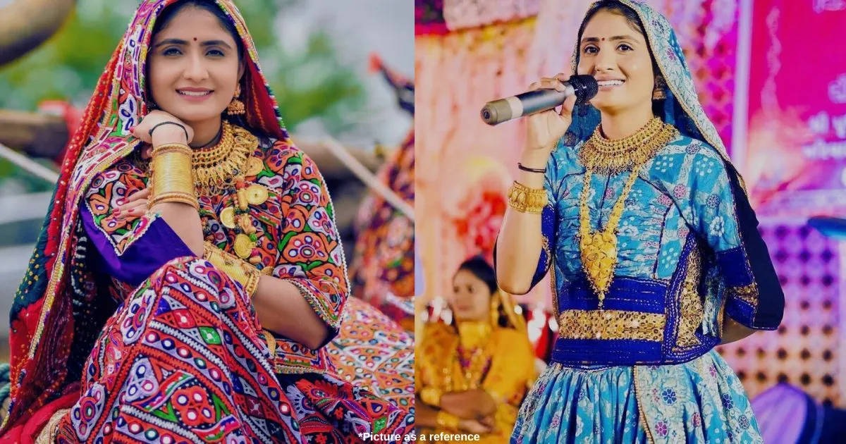 A girl named Geeta Rabari, a Gujarati singer with traditional kacchi clothes, sits with a smiley face. On the other side, she took mike in her hand and sang something.