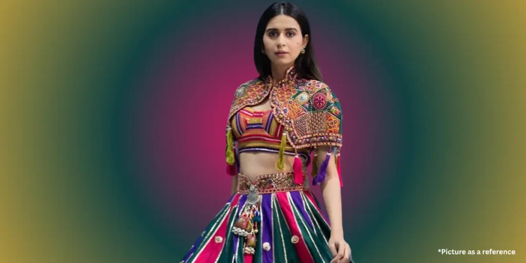 Kinjal Dave in a multicolored traditional Gujarati chaniya choli with mirror work.