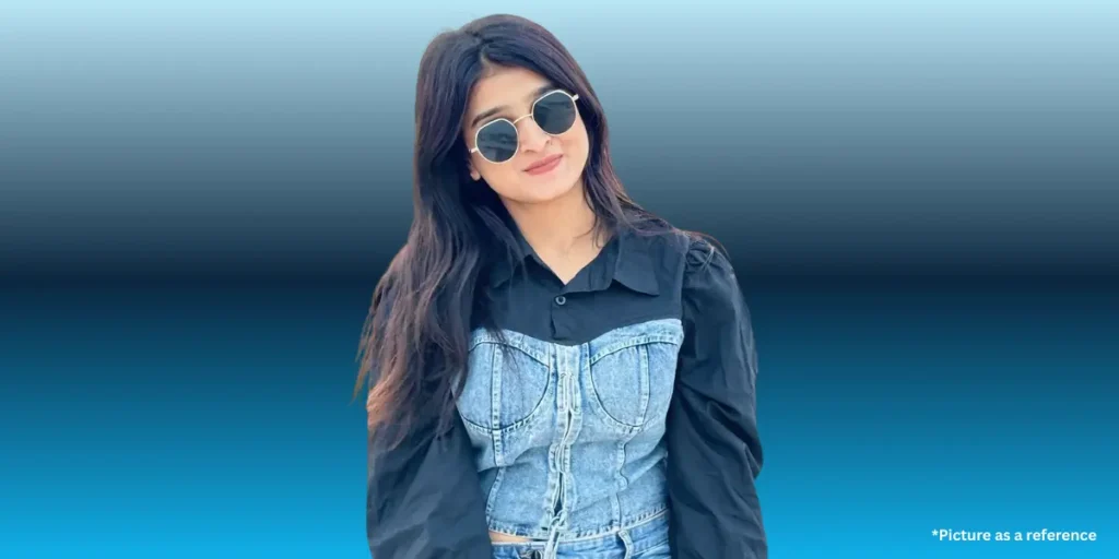 Geet Thakkar is in a casual outfit, wearing a corset top layered over a black collared shirt, with sunglasses.