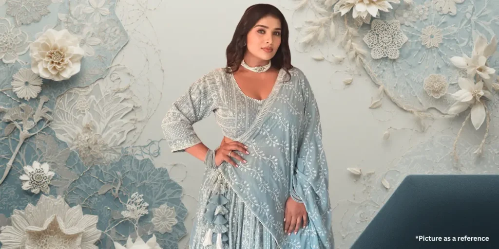 Actress Chhaya Thakor in a luxury grey lehenga with silver thread work and pearls.