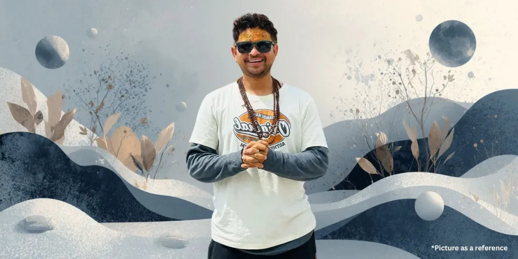 Khajur Bhai Nitin Jani wearing sunglasses and a traditional rudraksha mala set against a serene grey and blue landscape digital art background.