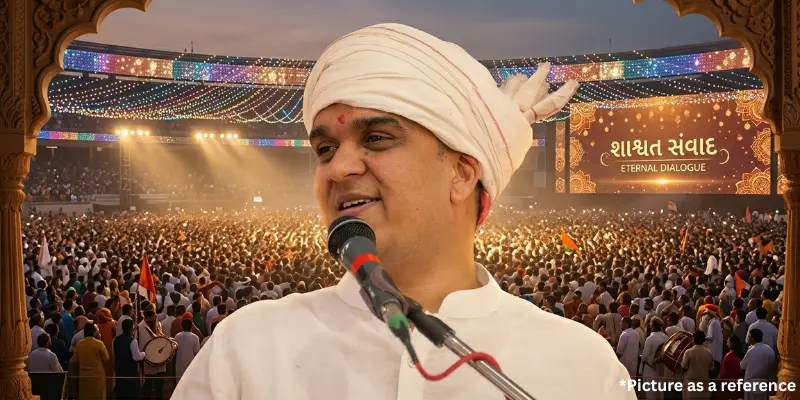 Harsh Sanghvi wearing a traditional white turban and addressing a massive crowd at a public rally.