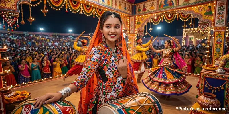 Gujarati folk singer Rinku Bharwad performing at a traditional Navratri Garba event with dhol and dancers.