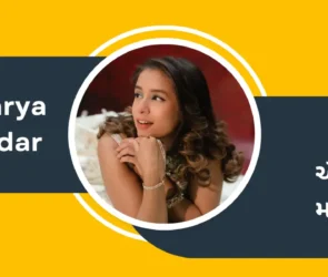 Profile banner for Indian singer Aishwarya Majmudar featuring her portrait in a circular frame over a yellow and charcoal gray graphic template.